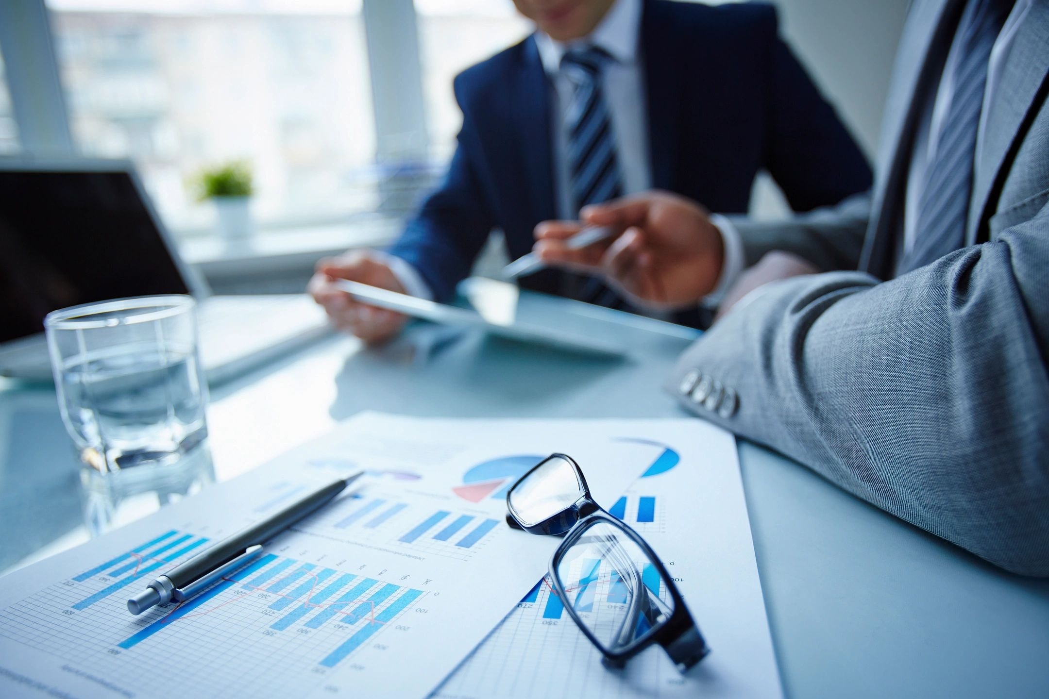 Business meeting with financial documents